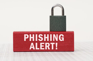 Poster - On the reports there is a red block with the inscription - Phishing alert and a lock.