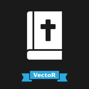 White Holy bible book icon isolated on black background. Vector