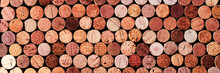 Banner Of Wine Cork From Red Wine, Natural Texture Used Bottle Stoppers Top View, Red Gradient. Horizontal Background From Closeup Wooden Corks. Natural Textured Stoppers Colored Wide Banner