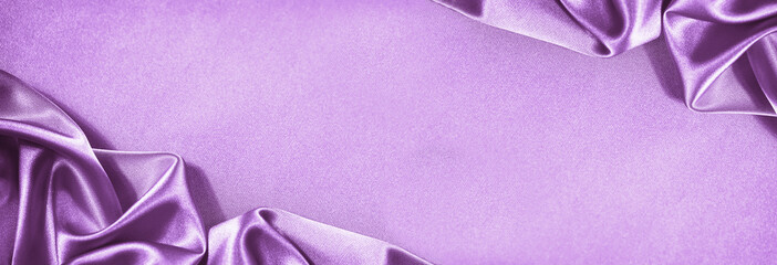 Wall Mural - Beautiful purple pink silk satin background. Soft folds. Shiny fabric. Luxury lilac background. Space. Design. Web banner. Wide. Panoramic. Flat lay, table top view. Wedding, Valentine, Mother's day. 
