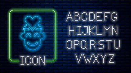 Poster - Glowing neon Volunteer icon isolated on brick wall background. Neon light alphabet. Vector