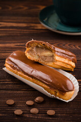 Wall Mural - Eclairs with chocolate topping close up