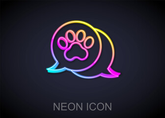 Poster - Glowing neon line Paw print icon isolated on black background. Dog or cat paw print. Animal track. Vector