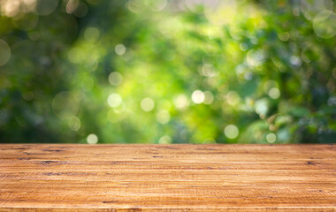 Canvas Print - wooden table close-up outdoors. Abstract background with bokeh