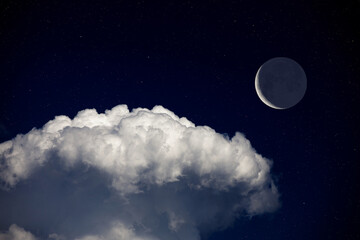 Wall Mural - fantasy night landscape, waning crescent moon surrounded by stars above cloud. daydreaming image.