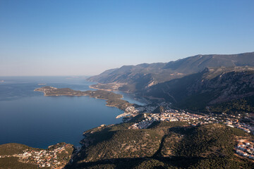 Wall Mural - Aerial view of touristic Kas district with its green nature and deep blue sea. Antalya - Turkey
