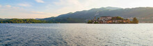 The Little Island Of San Giulio In Lake D'Orta Seen From The Waterfront Of The Little Town In Northern Italy
