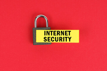 Poster - On the red surface there is a lock with a sticker with the inscription - Internet security