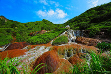 Golden Waterfall, Formed By The Interaction Of Groundwater And Iron Sulfide Ore. It Is Close To The Popular Tourist Village Of Jiufen, On The Northeastern Coast Of Taiwan.