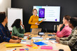 © Wavebreak Media - Smiling caucasian businesswoman discussing ideas with app developers in meeting at office