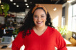 © Wavebreak Media - Portrait of happy biracial female design professional in creative office