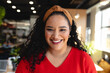 © Wavebreak Media - Portrait of happy biracial creative businesswoman in office