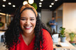 © Wavebreak Media - Portrait of smiling mid adult biracial creative businesswoman in office