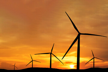 wind turbines in the sunset