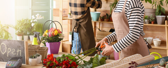 Wall Mural - Florists working together in shop