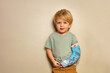 © Sergey Novikov - Boy positive despite broken hand in plaster cast after accident