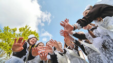 Happy Russian School Graduates Are Stretching Their Hands On Their Last School Day.