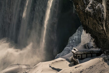 Winter In Niagara Falls, Ontario, Canada. Also Showing The Journey Behind The Falls Attraction.