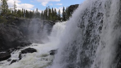 Wall Mural - Ristafallet waterfall in the western part of Jamtland is listed as one of the most beautiful waterfalls in Sweden.