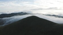 Aerial View Of Mountains In The Clouds In, Maluti A Phofung NU, Free, South Africa.
