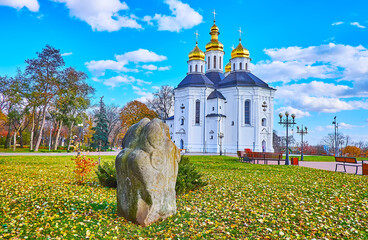 Canvas Print - St Catherine's Church behind the lawn with fallen leaves, Chernihiv, Ukraine