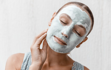 Wall Mural - Pretty Woman with Clay Face Mask