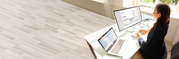 Poster - Businesswoman Checking Invoice On Computer