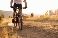 Professional Mountain Bike Cyclist Riding A Trail In The Forest. Adventure Sports Outdoor. 