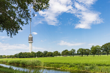 Landscape with Beilervaart and transmission tower Smilde in the backgroundThe Netherlands