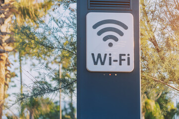 Wi-fi access point for wireless connection and digital communication in city park. Modern technology for lifestyle convenience