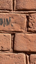 Old Wall. Red Brick Wall With Signature. Graffity In The Fence