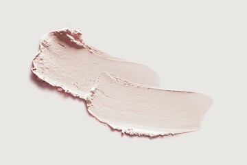 Poster - Cosmetic pink beige mask or cleanser texture smudge swatch foam on gray background