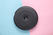 © splitov27 - Barbell disc on blue pink pastel background