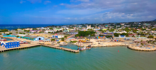 Wall Mural - Ships, boats, containers, Puerto Plata harbor, port and cityscape of the industrial zone, Dominican Republic