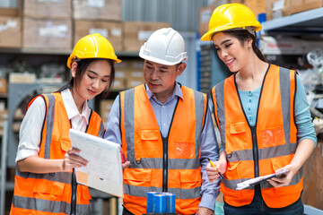 Team Foreman or Team worker work at factory site check up machine or products in site. Team Engineer or Team Technician checking Material or Machine on Plant. Heavy industry factory concept.