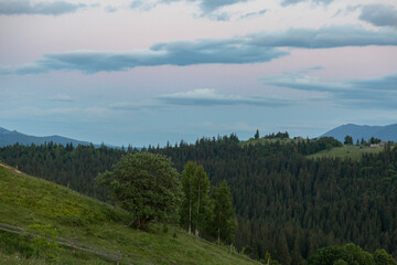 Pink and purple sunset in the mountains.