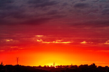 Wall Mural - sunset over a village