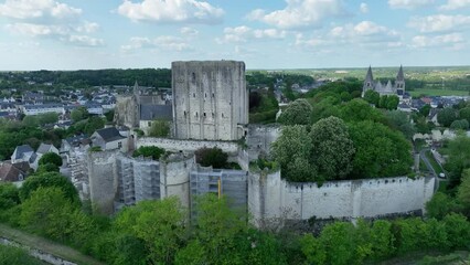 Wall Mural - Panning shot around the Royal Donjon of Loches Loire Valley France, feudal medieval stronghold on a sunny spring day with scaffolding used to restore the walls