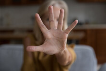 Close Up Focus Unrecognizable Older Female Show Palm To Cam, Stretched Her Hand To Camera Makes Stop Gesture, Say No, Opposes Age Or Gender Discrimination, Against Domestic Violence, Protest Concept