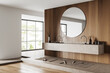Light bathroom interior with washbasin and mirror, accessories and window