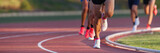 Athletics people running on the track field.Running a race on a track for sports competition and winning