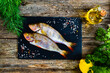 Fresh raw perch on wooden table
