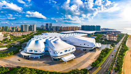 Wall Mural - Aerial View of Haikou City Western Coast, with Hainan International Convention And Exhibition Center, Office Buildings, Residential Apartments in the View.