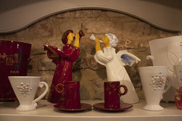 Wall Mural - Ceramic angels in a souvenir shop in Vilnius