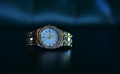 Wall Mural - Luxury watches placed on a glittering glass floor	