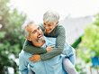 Leinwandbild Motiv woman man outdoor senior couple happy lifestyle retirement together smiling love piggyback active mature