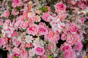 Wall Mural - Big bouquet of flowers in a vase on a gray wall background