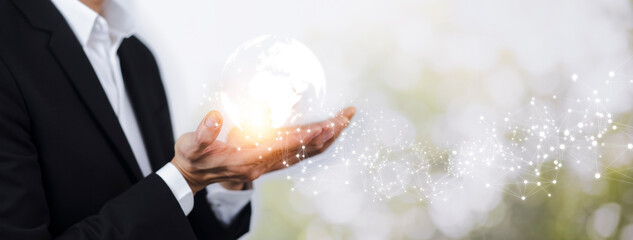 Poster - Concept Technology with line connects the world, Businessman holding hands with global connection on the nature background, global networking and global information exchange 3D rendering.