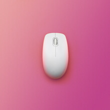 Modern Wireless Computer Mouse On Pink Background, Top View