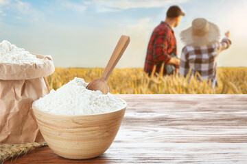 Wall Mural - Farmers in field on sunny day